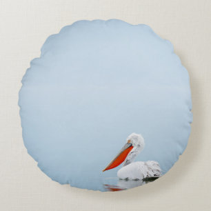PELICAN ON BLUE WATER ROUND CUSHION