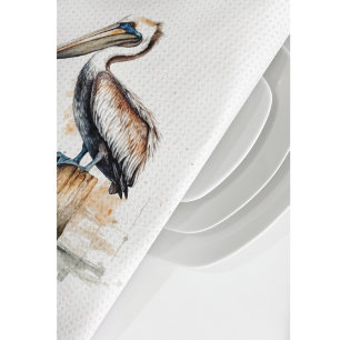 Pelican standing on a pole  tea towel