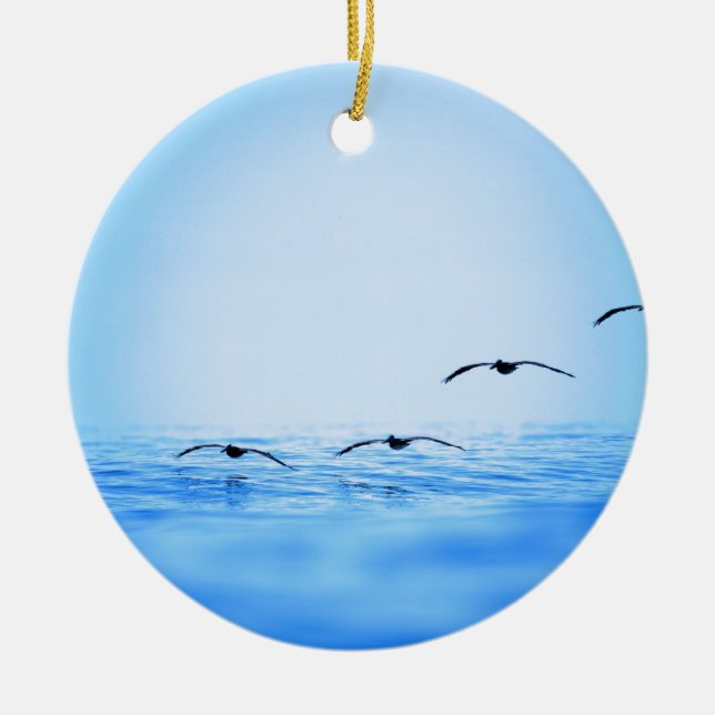 Pelicans flying over ocean ceramic tree decoration (Front)