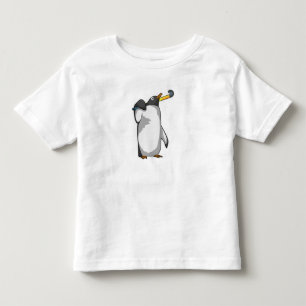 Penguin at Hockey with Hockey stick Toddler T-Shirt