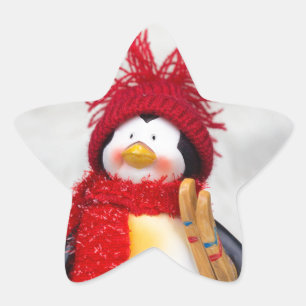 Penguin figurine with white christmas tree star sticker