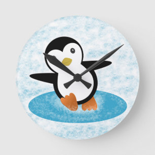 Penguin ice skating in the snow round clock