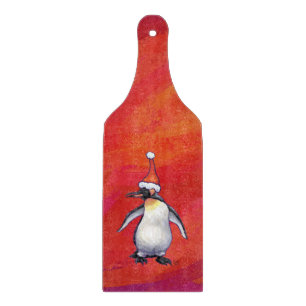 Penguin in Santa Hat on Red Cutting Board
