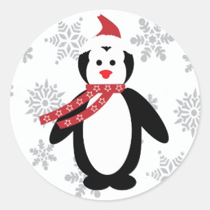 Penguin in the Snow with Santa's Hat on Sticker