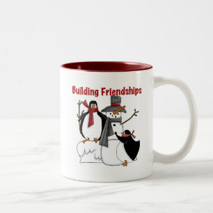 Penguins Building Friendship tshirts and Gifts Two-Tone Coffee Mug