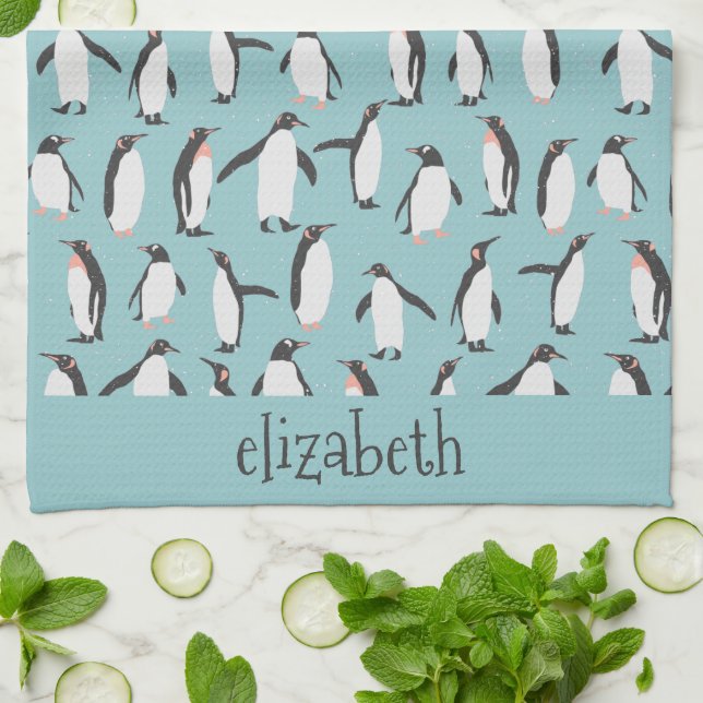 Penguins in the snow pattern tea towel (Folded)