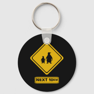 penguins road sign key ring