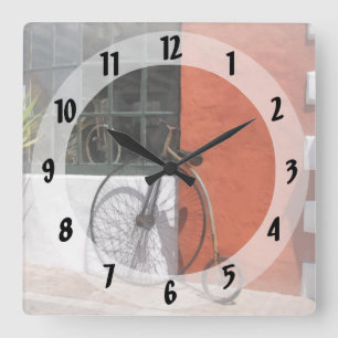 Penny-Farthing in Front of Bike Shop Square Wall Clock