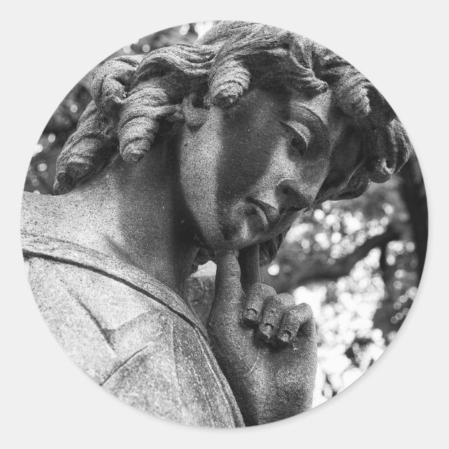 Pensive angel looking down classic round sticker (Front)