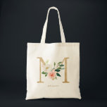 Peony Floral Letter M Gold Monogram Bridesmaid Tote Bag<br><div class="desc">Floral letter M monogram tote bag features watercolor floral bouquet of white and blush pink peonies and roses, greenery accent and faux gold foil letter. This letter M floral bridesmaid monogram tote bag is perfect for weddings, showers, birthdays and so much more. Personalise by adding names or a short phrase....</div>
