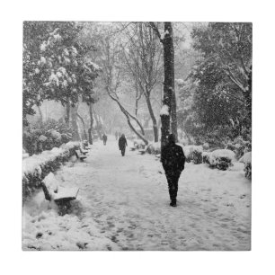 People at park in snowy winter day tile
