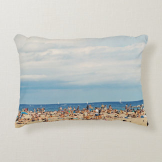 People on brown sand beach decorative cushion