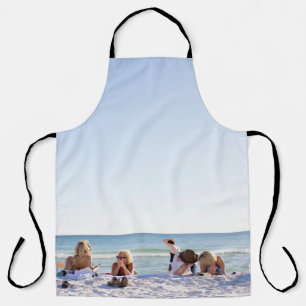 People on white sands by the beach apron