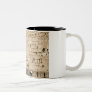 People praying at the wailing wall Two-Tone coffee mug