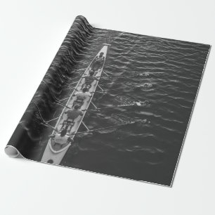 PEOPLE RIDING BOAT ON BODY OF WATER WRAPPING PAPER