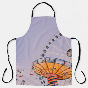 People riding on yoyo ride at daytime apron