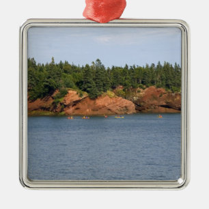 People sea kayaking in the Bay of Fundy at St. Metal Tree Decoration