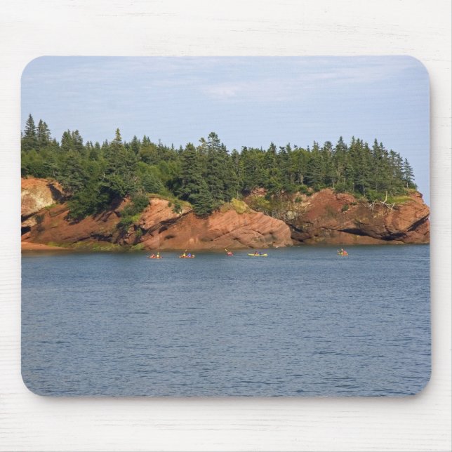 People sea kayaking in the Bay of Fundy at St. Mouse Mat (Front)