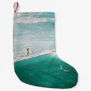 People standing and swimming on swimming pool besi small christmas stocking