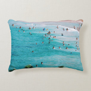 People swimming in the beach decorative cushion