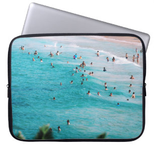 People swimming in the beach laptop sleeve