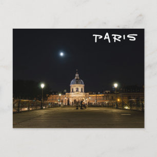 People walking on Pont des Arts at nigth - Paris Postcard