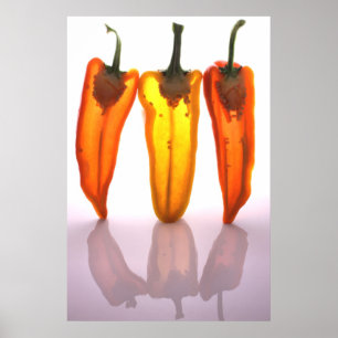 Peppers in half with light through them poster