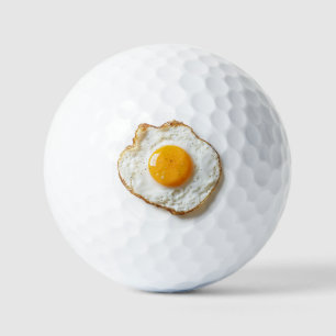 Perfectly Fried Egg with Crisp Edges and Golden Yo Golf Balls
