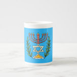 Persian Magen David Menorah Bone China Mug<br><div class="desc">This image was adapted from an antique Persian Jewish tile and features a menorah with a Magen David (Star of David) framed by olive branches.  The imperfections of the original,  hand-painted image have been preserved.</div>