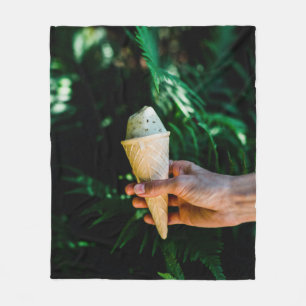 Person holding ice cream fleece blanket