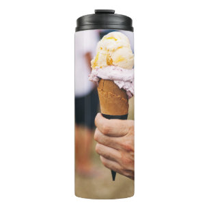 Person holding ice cream on cone thermal tumbler
