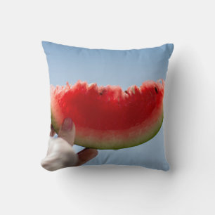 Person holding sliced watermelon cushion