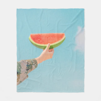 Person holding sliced watermelon fleece blanket