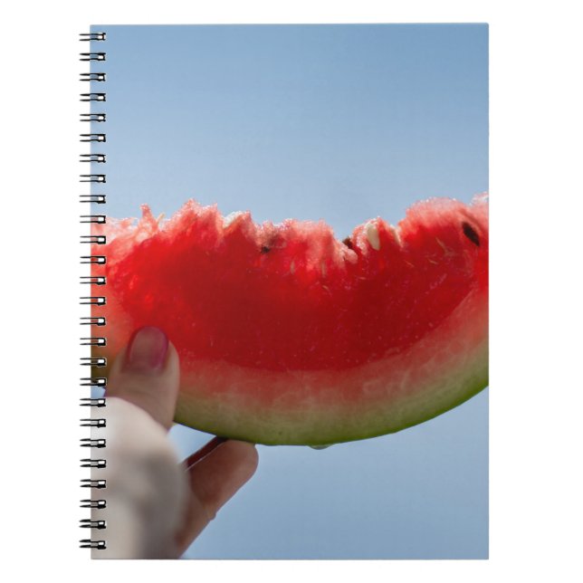 Person holding sliced watermelon notebook (Front)