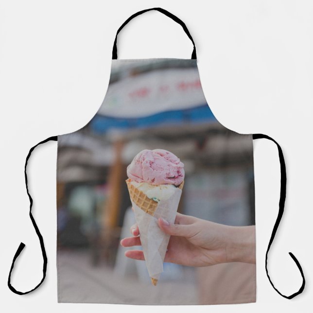 Person holding strawberry ice cream apron (Front)