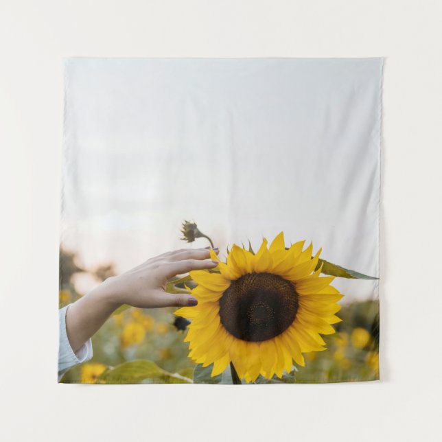 Person holding sunflower tapestry (Front)