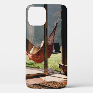 Person on brown swing iPhone 12 case