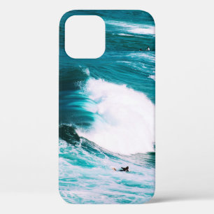 Person on surfboard with ocean waves iPhone 12 case