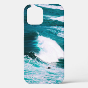 Person on surfboard with ocean waves iPhone 12 case