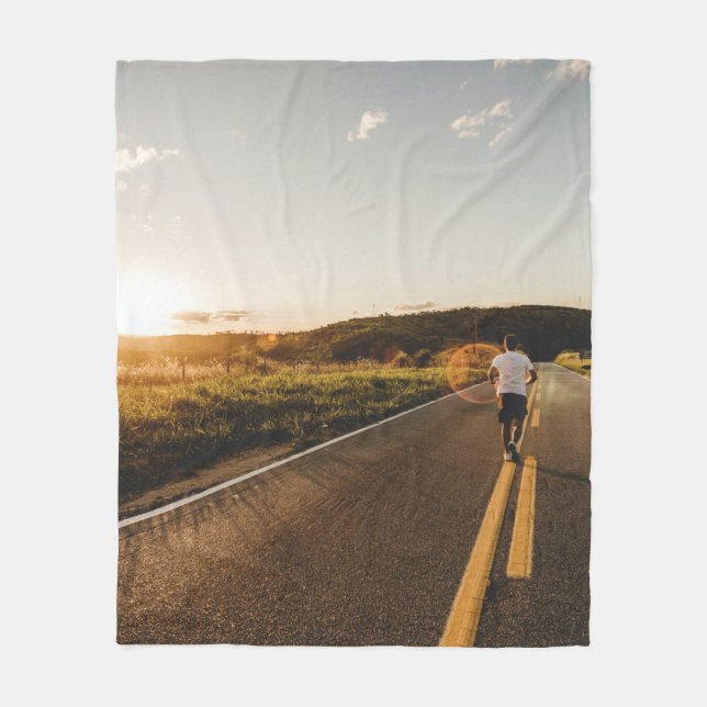Person running in road in the morning fleece blanket (Front)