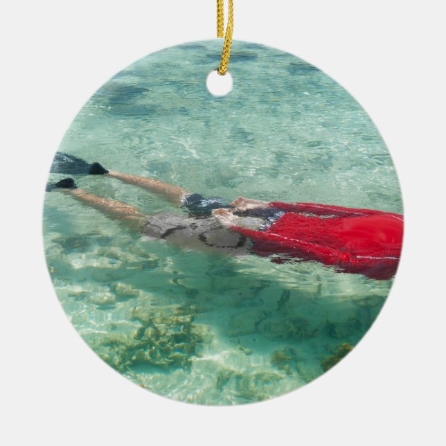 Person snorkelling in clear water ceramic tree decoration (Front)