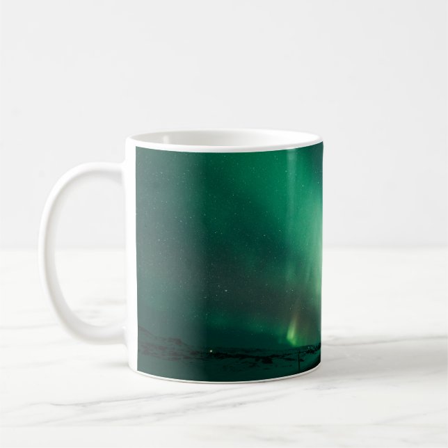 PERSON STANDING IN FRONT OF AURORA LIGHTS COFFEE MUG (Left)