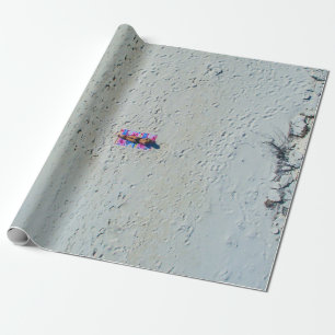 Person sunbathing at the beach wrapping paper