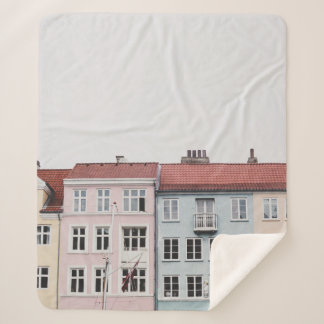 PERSON TAKING PICTURE OF STRUCTURES SHERPA BLANKET