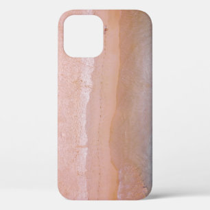 Person walking on sand near seashore leaving foot iPhone 12 case