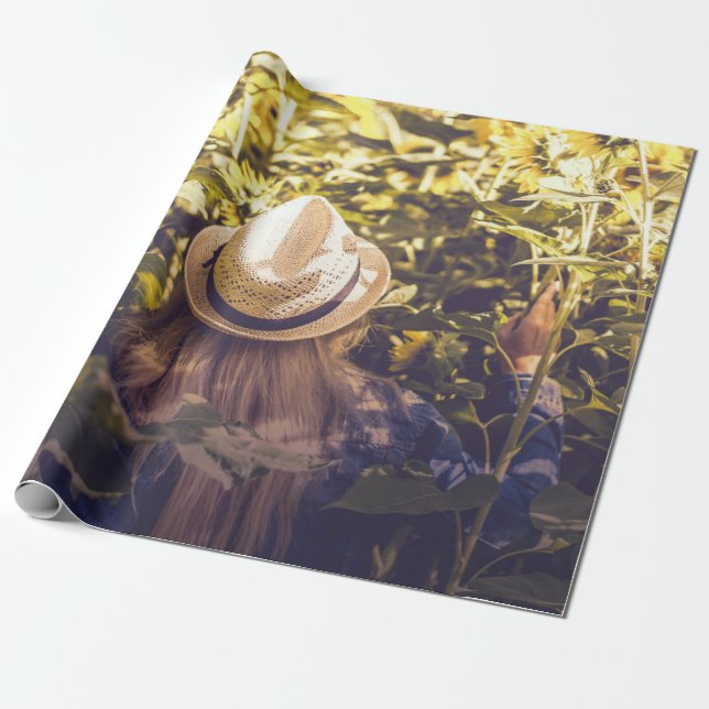 Person wearing white hat beside sunflower fields wrapping paper (Unrolled)