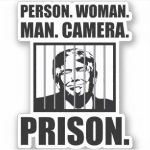 Person. Woman. Man. Camera. Prison.