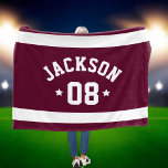 Personalised Athlete Name and Number Burgundy Red Fleece Blanket<br><div class="desc">Personalised sports fleece blanket for athletes features a first or last name in curved sporty lettering along with a team number. Wide horizontal stripes and stars accent this simple and stylish design. The colour scheme of burgundy red and white can be modified to coordinate with your club or school colours....</div>