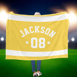 Personalised Athlete Name and Number Yellow Fleece Blanket<br><div class="desc">Personalised sports fleece blanket for athletes features a first or last name in curved sporty lettering along with a team number. Wide horizontal stripes and stars accent this simple and stylish design. The colour scheme of yellow and white can be modified to coordinate with your club or school colours.</div>