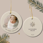 Personalised Baby Girl's First Christmas Ornament<br><div class="desc">Capture the magic of your baby girl's first Christmas with our "Personalised Baby Girl's First Christmas Ornament." The front of this exquisite ornament features a precious photo of your little one, framed by a graceful champagne gold snowflake on the left, with customisable text below to mark the occasion. The light...</div>